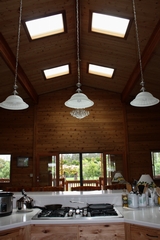 Custom remote home by Mauna Loa Cedar Homes
